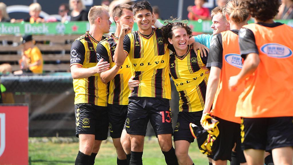 Charleston Battery celebrating with smiles as a team